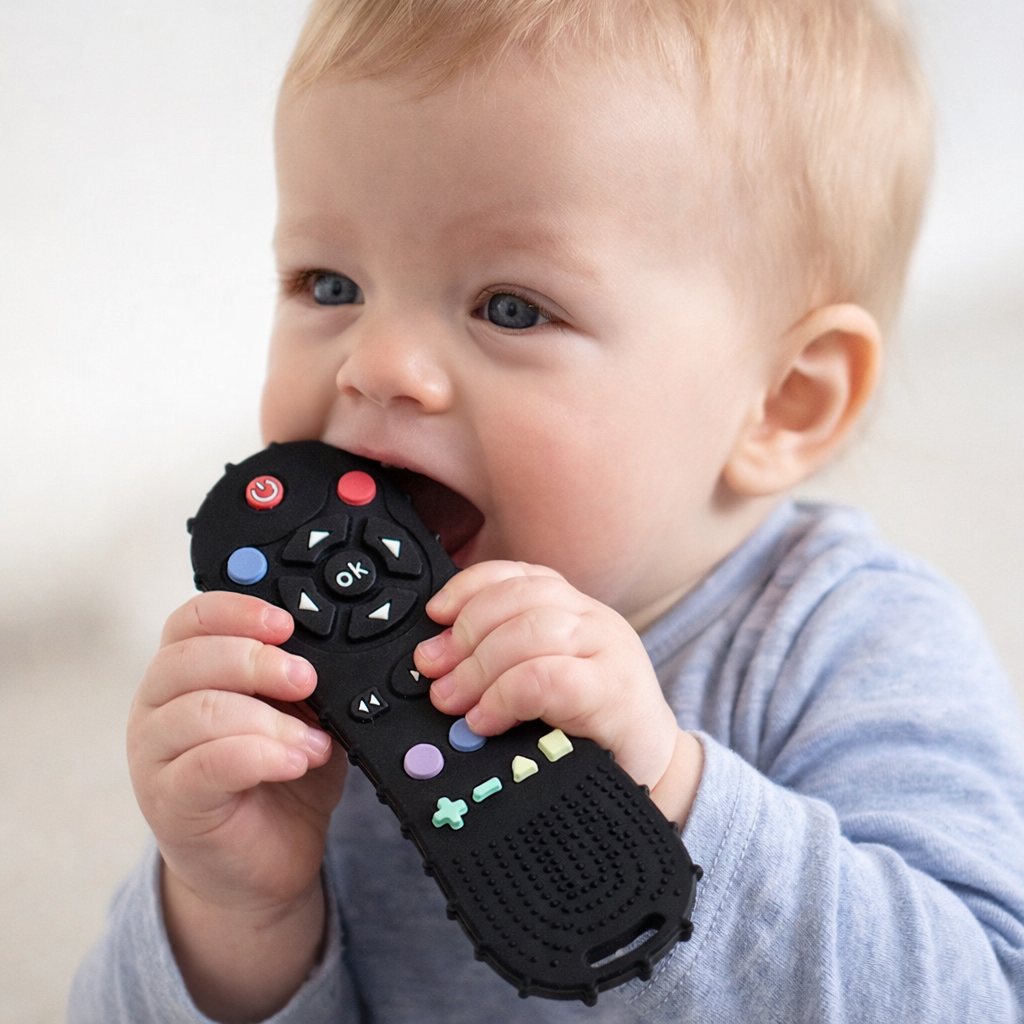 Anneau de dentition en forme de télécommande