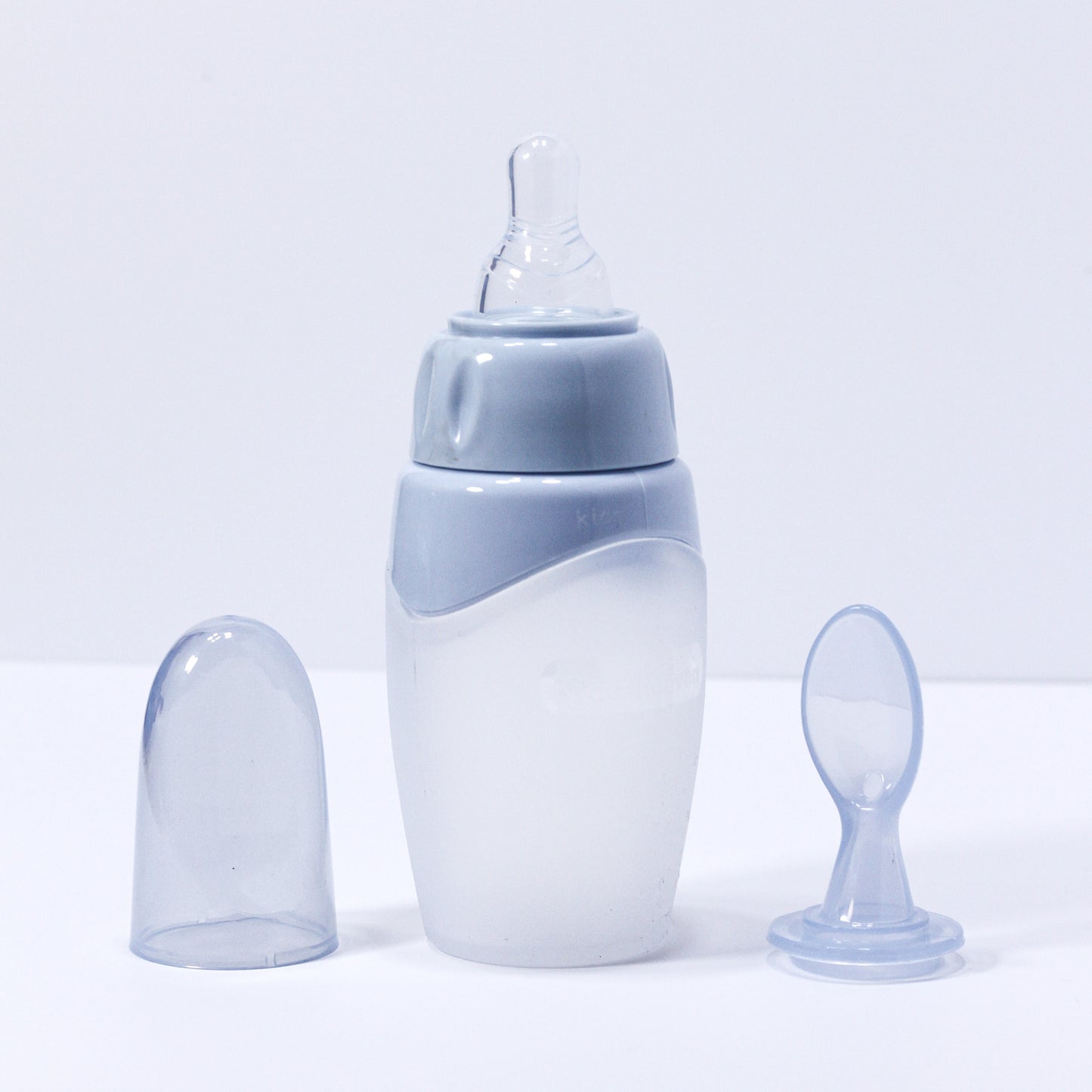 Biberon et Cuillere 2en1