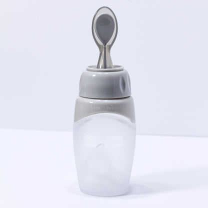 Biberon et Cuillere 2en1